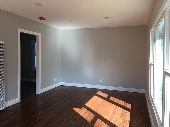 Living room with view of connection to breakfast nook