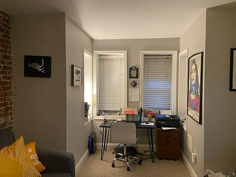 Front living area. Nice for desk or small dining table.