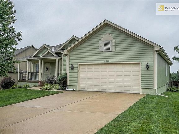 Enjoy relaxing and greeting neighbors from your charming front porch!