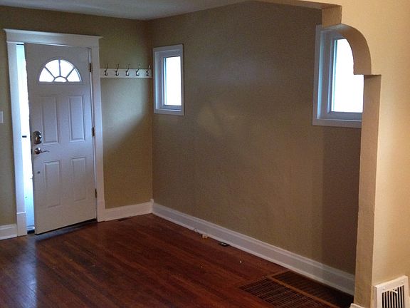View of front door from dining room.