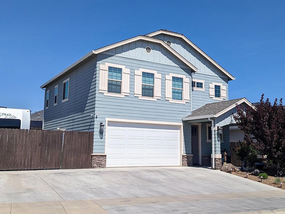 Large lot, lots of extra parking. Low maintenance hardscape front yard all on automatic controller