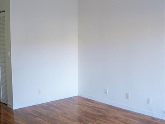 Master bedroom with vaulted ceiling