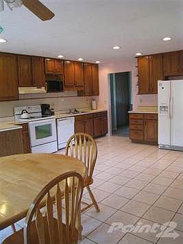Lots of cabinet space. Beautiful ceramin tile flooring and backsplash.