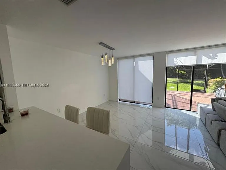 9729 Costa Del Sol Blvd #Townhouse C-101 — Photo 3