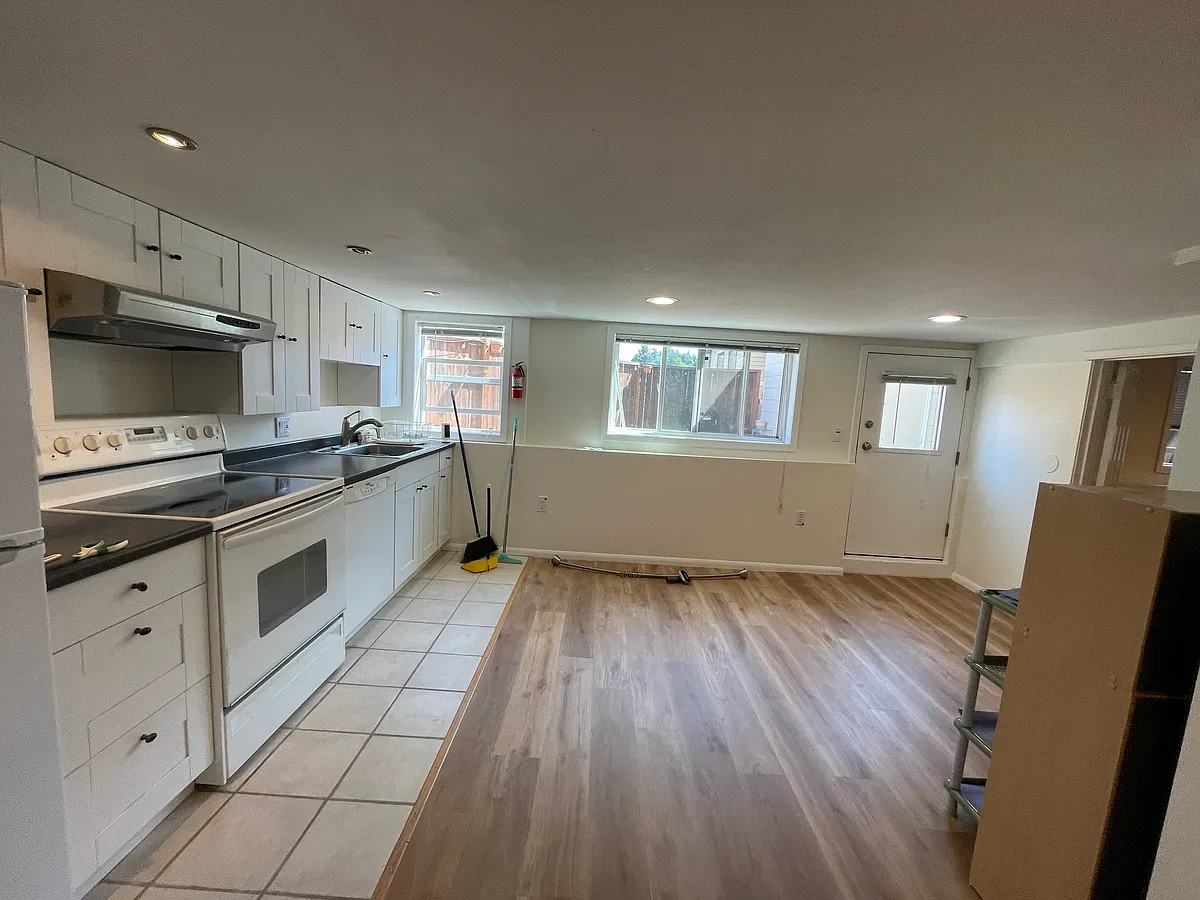 Kitchen with eat in area. - 6608 Linden Ave N #2B