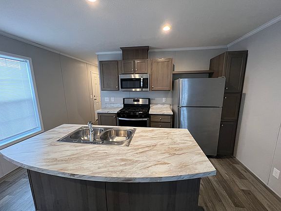 4th image of 38000 Le Chateau Blvd #392