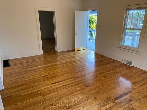 Spacious living room off the front porch. Nice cozy home with a new storm windows and forced air gas heat.