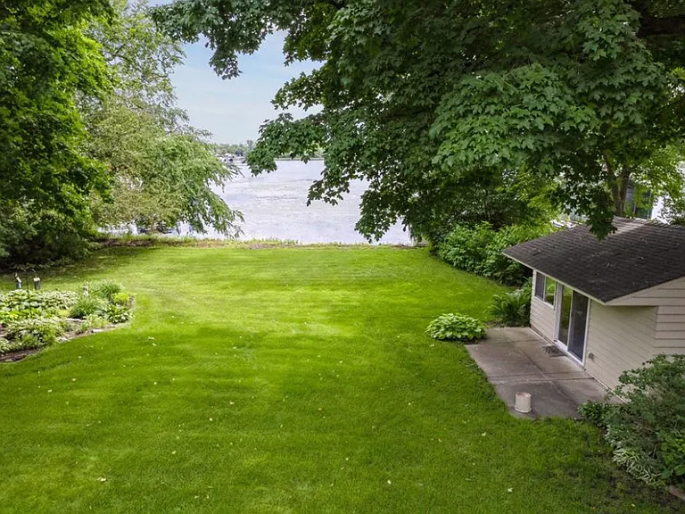 Level backyard with East lake views