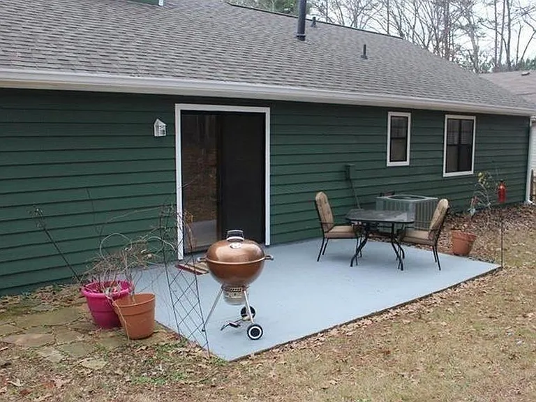 Level backyard concrete patio