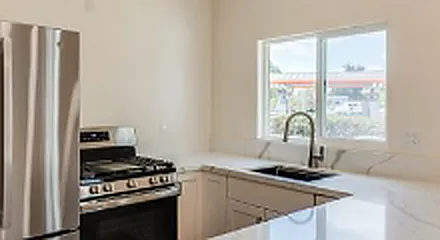Kitchen with all new counters, cabinets, and appliances
