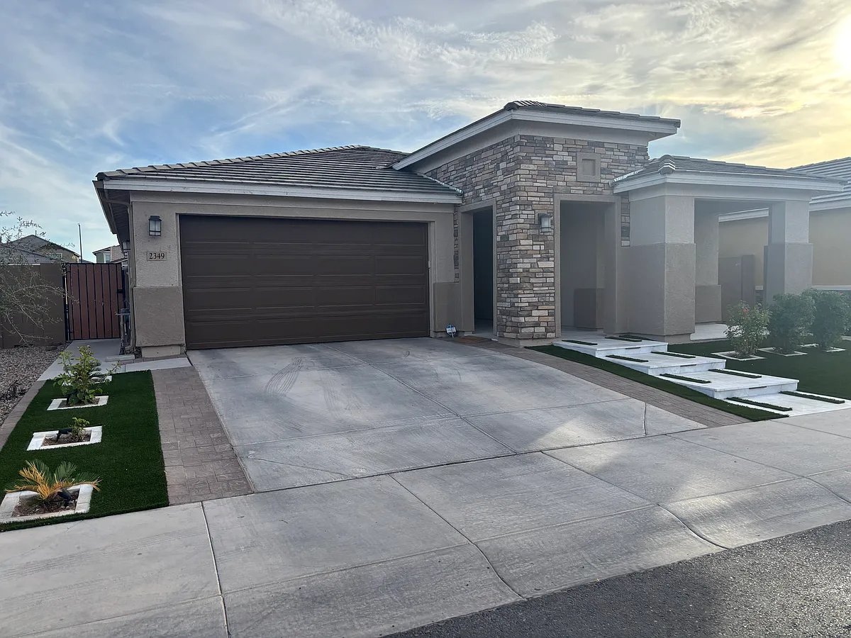Fully landscaped front yard for great appeal and low maintenance. - 2349 E Citadel Dr