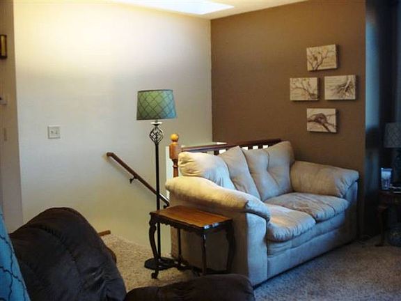 living room with skylight