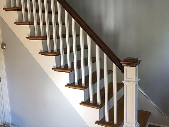 Staircase to two bedrooms