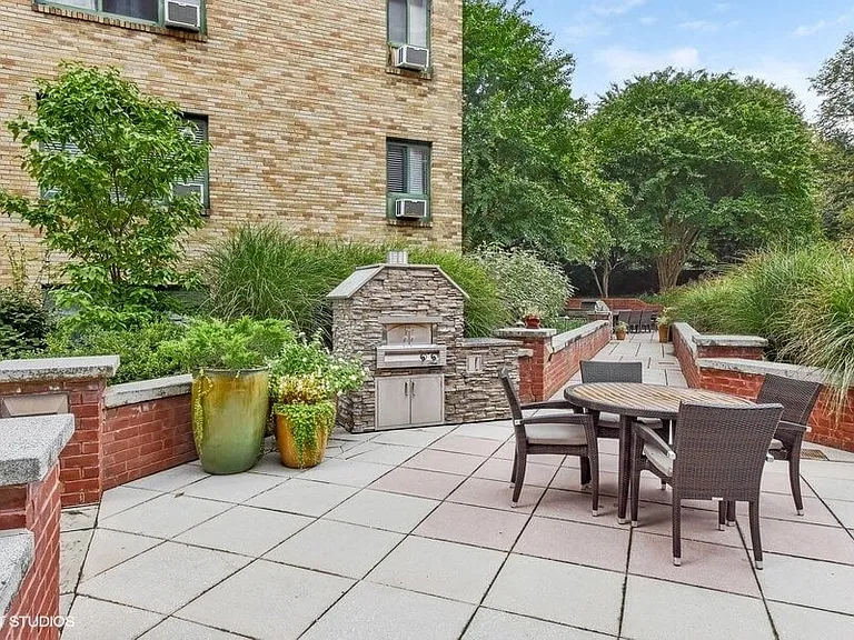 Beautifully Landscaped Courtyard With Summer Kitchens