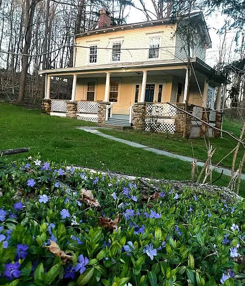 Front of 1830's farmhouse apartments at Burnside