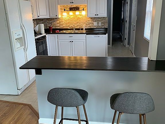 Bar overlooking kitchen