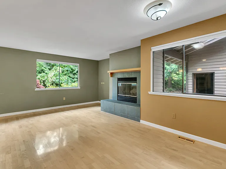 You can see the garage out the window. The walkway from the garage is vaulted with skylights and fully covered for your walk to the front door.