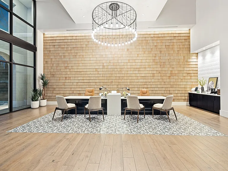 Modern leasing office with stylish design, comfortable seating, and a welcoming atmosphere for future residents.