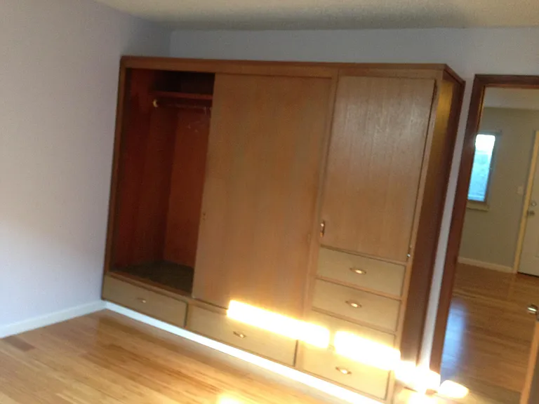 Bedroom with built in storage unit
