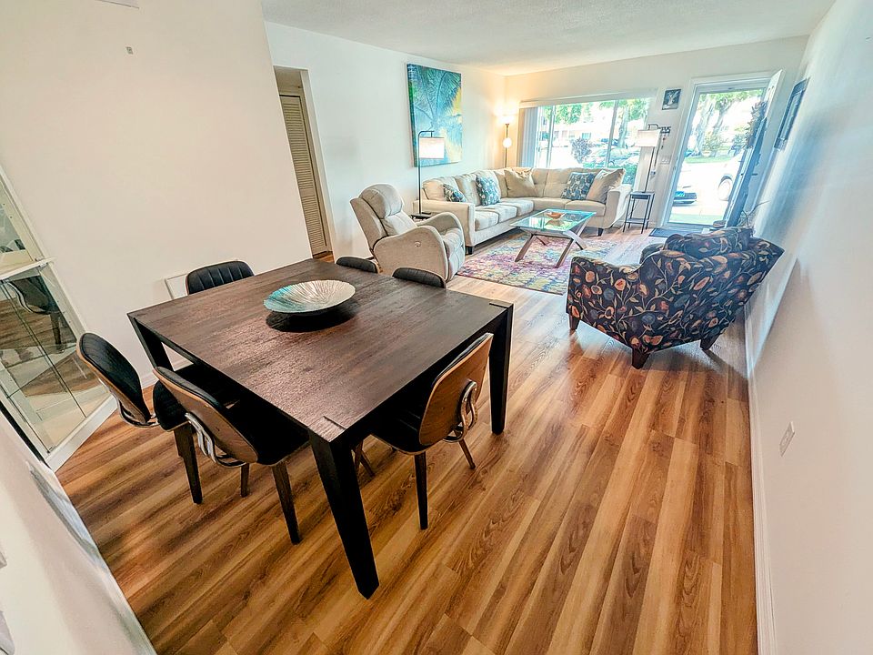 Bright, open, and clean living room and dining area