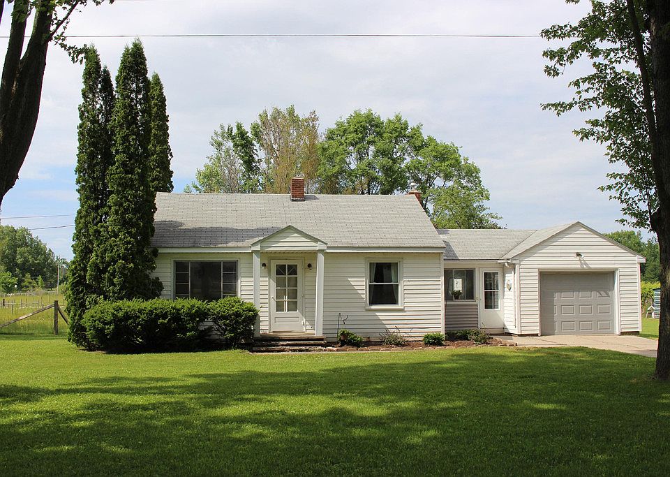 Sweetheart Homestead in Mills Township!  This fantastic little horse farm is located just a few miles north of Midland on 5.45 acres. The house has been recently remodeled including new drywall, flooring and paint, brand new stainless kitchen appliances, and updated bath. Low maintenance vinyl windows and siding, plus brand new washer/dryer!  You'll love the convenient insulated/heated garage with new overhead door and large mudroom. New over-sized septic tank and field in 2011. The 60x48 Barn sports a newer steel roof and all decked out with water, electricity, 5 top notch box stalls, heated tack room, and 3-12 foot overhead doors in the front for trucks & tractors!  There's also a chicken coop, cellar, free standing lean-to and shed. And the garden is planted! This farm is well maintained and affordable! City water at the road.