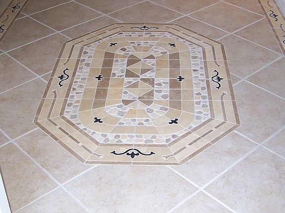 Inlaid tile in front entrance