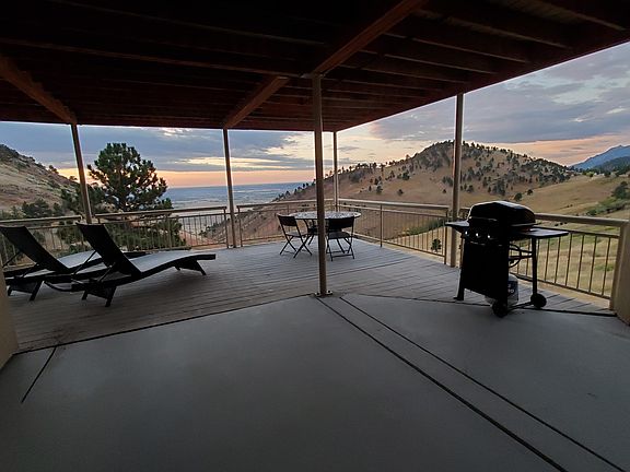 Deck with sunrise view. Furniture and grill included in rental.