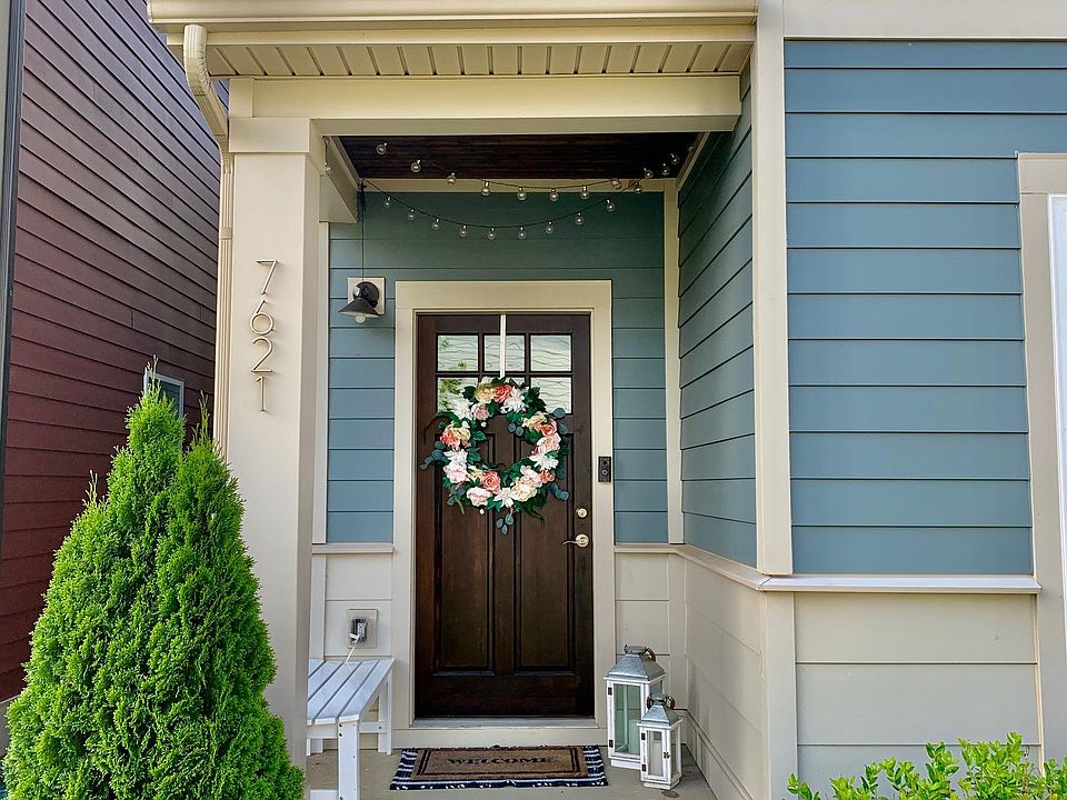 Front Porch Faces Lawn and Courtyard
