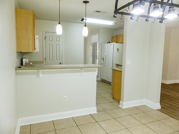 Dinette view into kitchen.