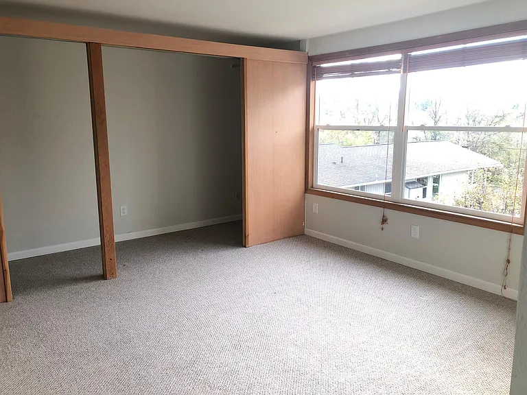 This is the larger of the two rooms upstairs. In the past, it was used as an exercise room.