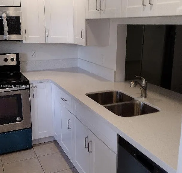 1151 NE 210th Ter #1151 — Photo 1