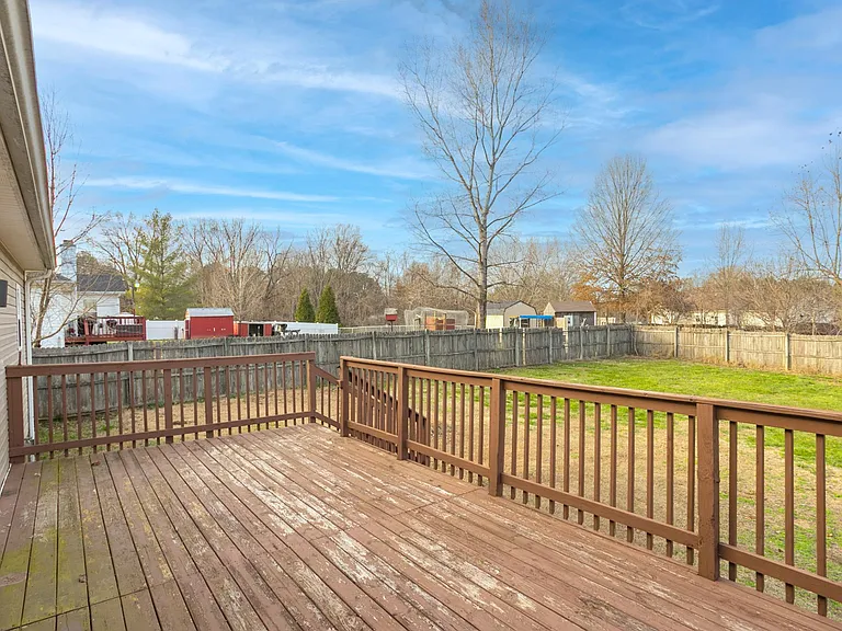 Large fenced backyard. Deck will get a new coat of paint as soon as the weather warms up
