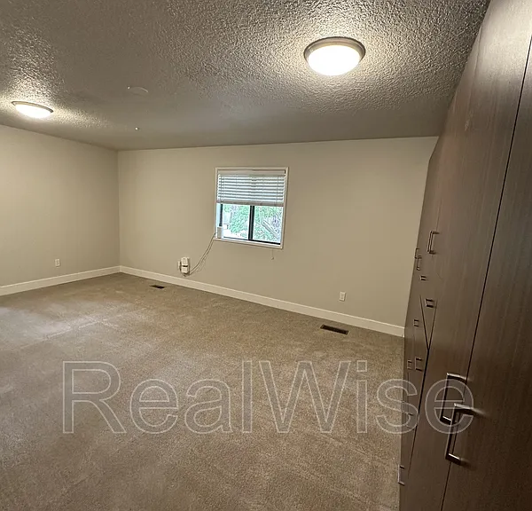7730 SW Eaker Pl — Photo 22