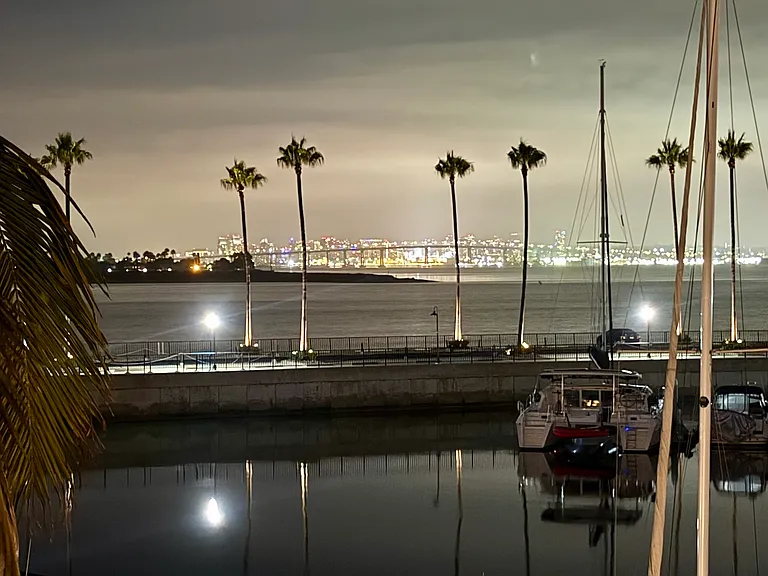 Zoomed view from Master Bedroom's balcony/deck to lights of Coronado Bridge and downtown San Diego.