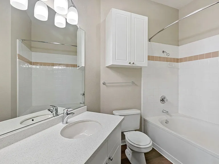 Our renovated bathrooms feature garden sized tubs, new flooring, fixtures and quartz counters