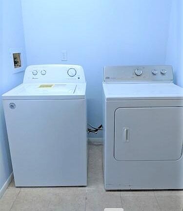Seperate Laundry room with newer Washer Dryer