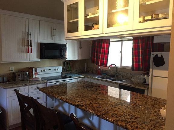 A view of the kitchen, prior to the installation of the new microwave in 2019.