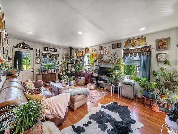 Wood floors throughout main level add a richness to the space. Updated windows throughout. 