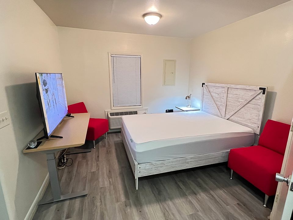 Bedroom, furnished view. The unit furnished as opposed to not being furnished totals: Unfurnished: $350 week/ $1400 month. Furnished: $475 week/ $1900 month. Deposit required.