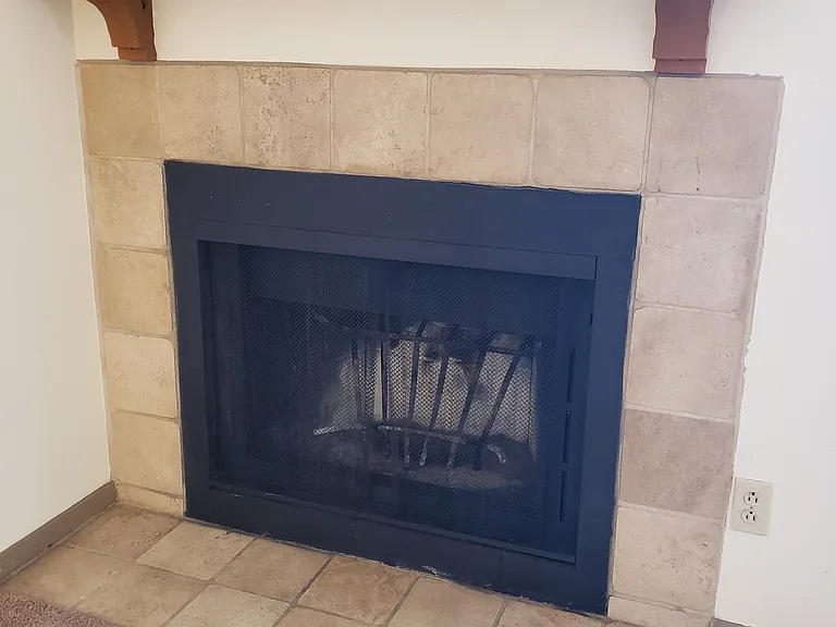 Working fireplace with mantle.