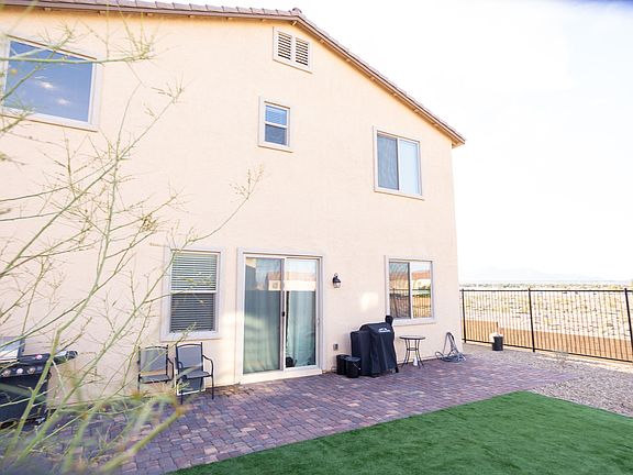 Pavers run length of house
