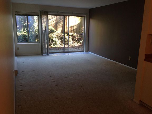 Living room with private patio area