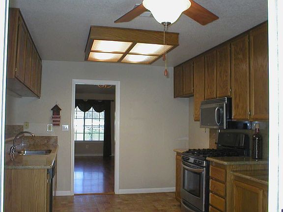 Kitchen has Granite Countertops & SS Appliances