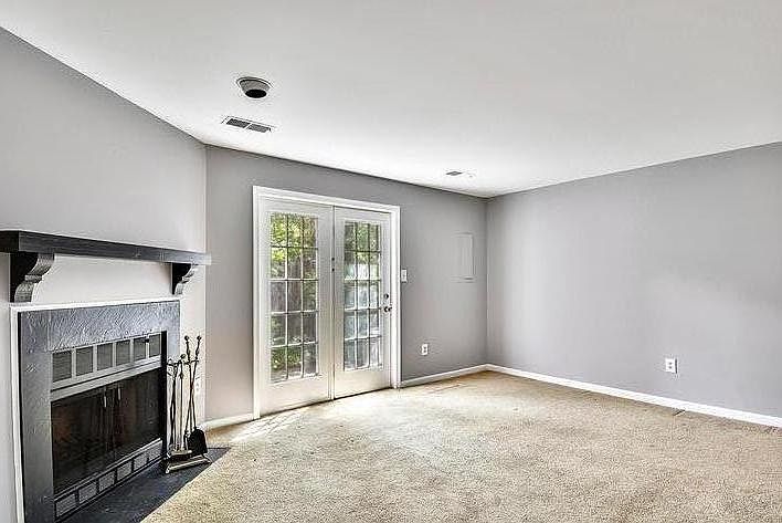 Basement Den or Bedroom with Wood Burning Fireplace