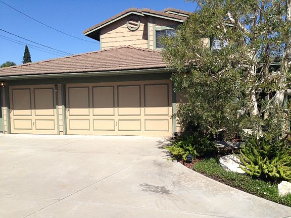 driveway and 3 car garage