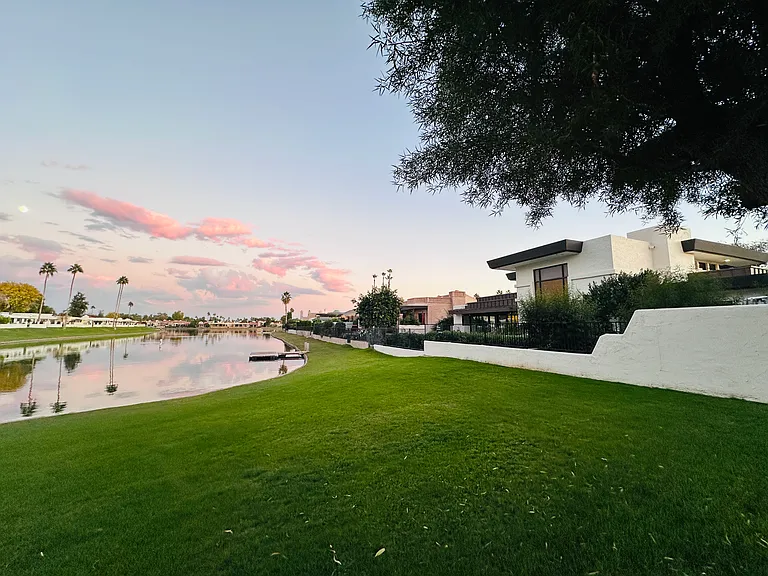 Back of the house with the stunning lake view .