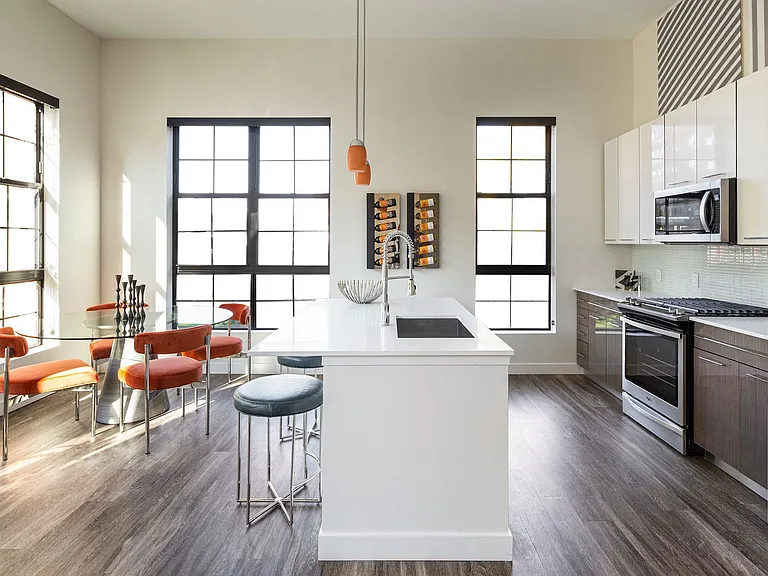 Inside, the interiors are modern and the floor-to-ceiling windows fill the rooms with light