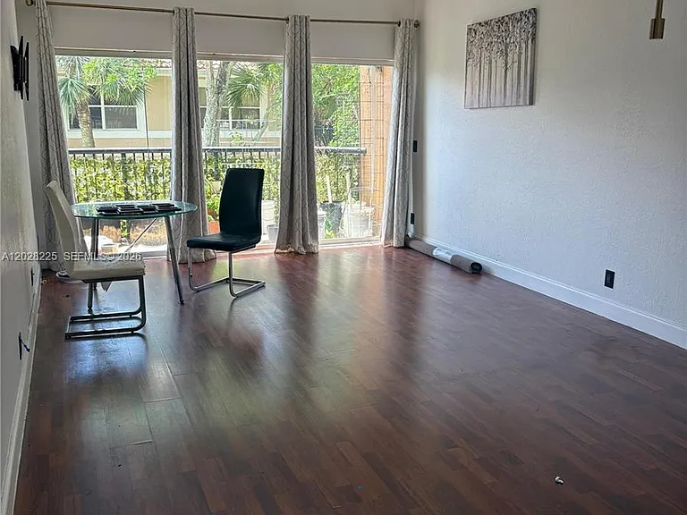 8761 Wiles Rd #301 — Photo 1