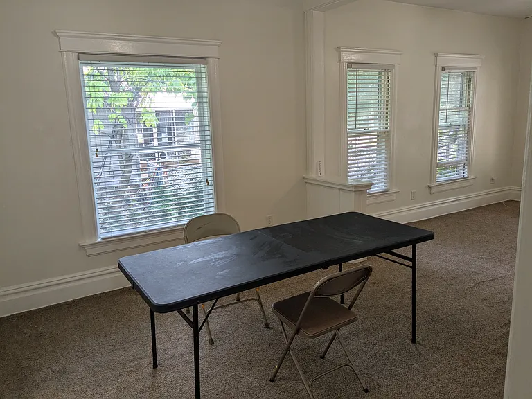 Dining and Living Room with Divider
(Table and chairs not included)