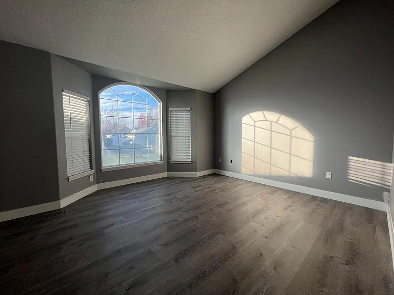 Formal living room w/ bay window